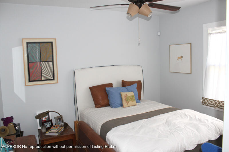 217 Malverne Road West Palm Beach, FL 33405 - Photo 7 of 9 a bedroom with a bed and window