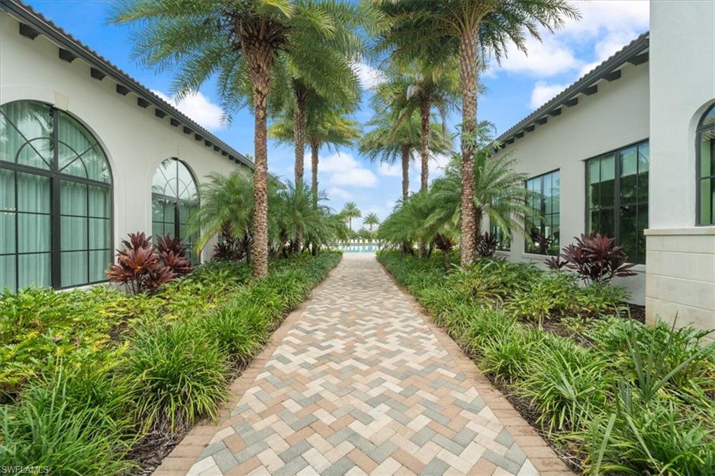 5474 Cassidy Lane Ave Maria, FL 34142 - Photo 16 of 31 a view of a pathway with a house