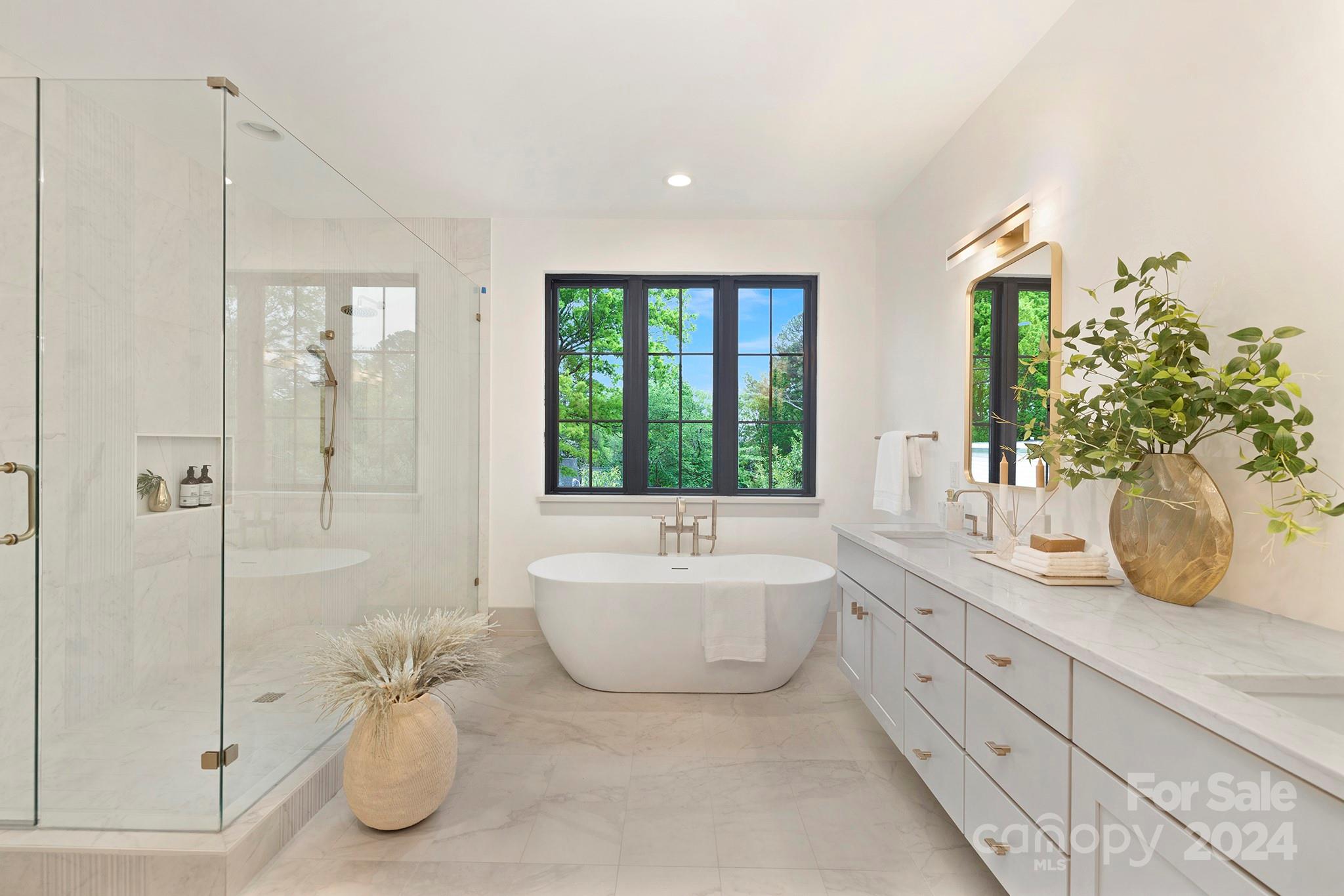 1815 Club Road Charlotte, NC 28205 - Photo 26 of 42 a bathroom with a tub sink and mirror
