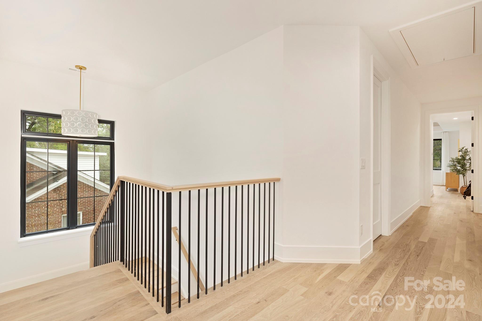 1815 Club Road Charlotte, NC 28205 - Photo 30 of 42 a view of a hallway with windows