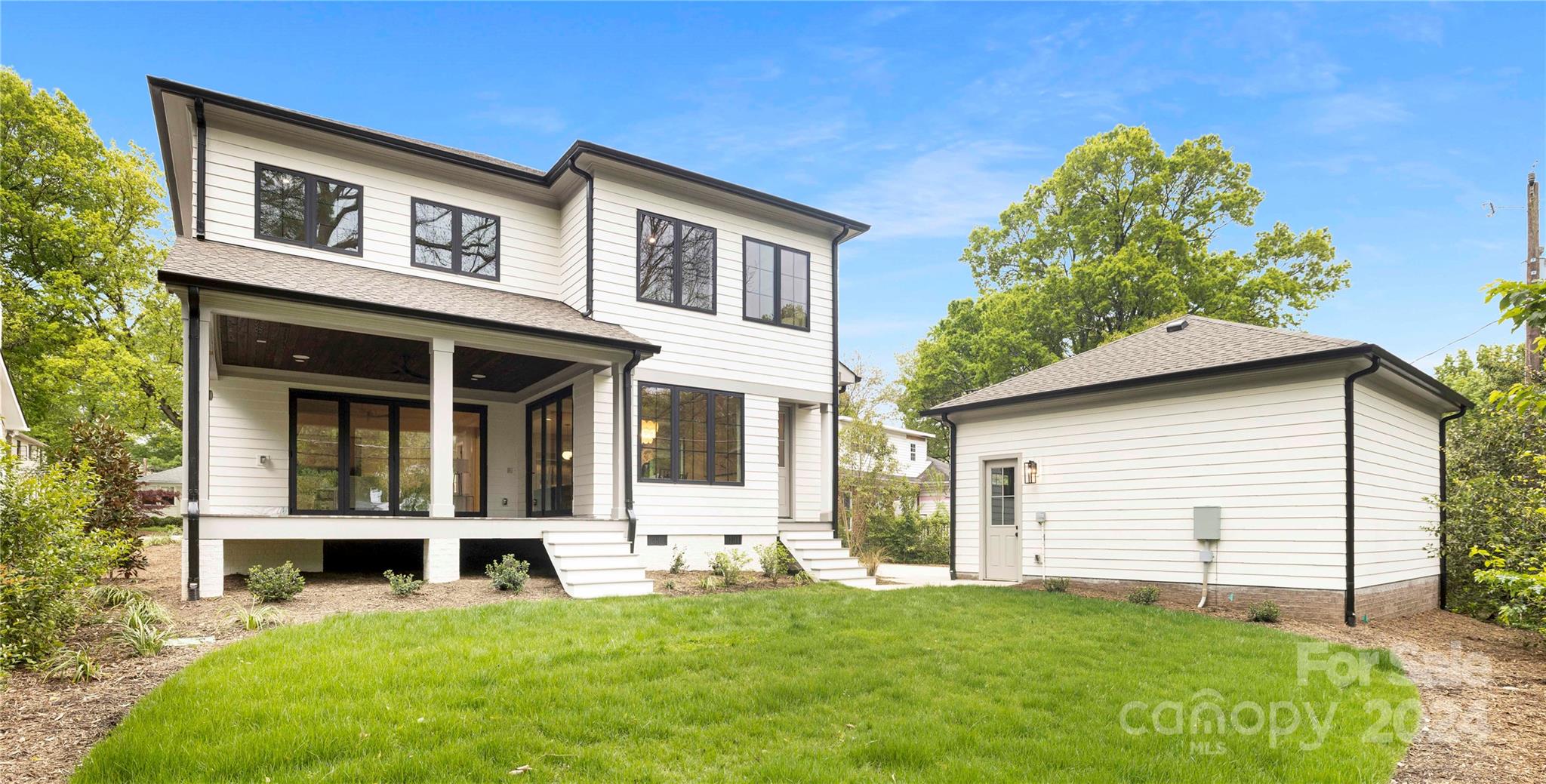 1815 Club Road Charlotte, NC 28205 - Photo 40 of 42 a view of a house with a yard