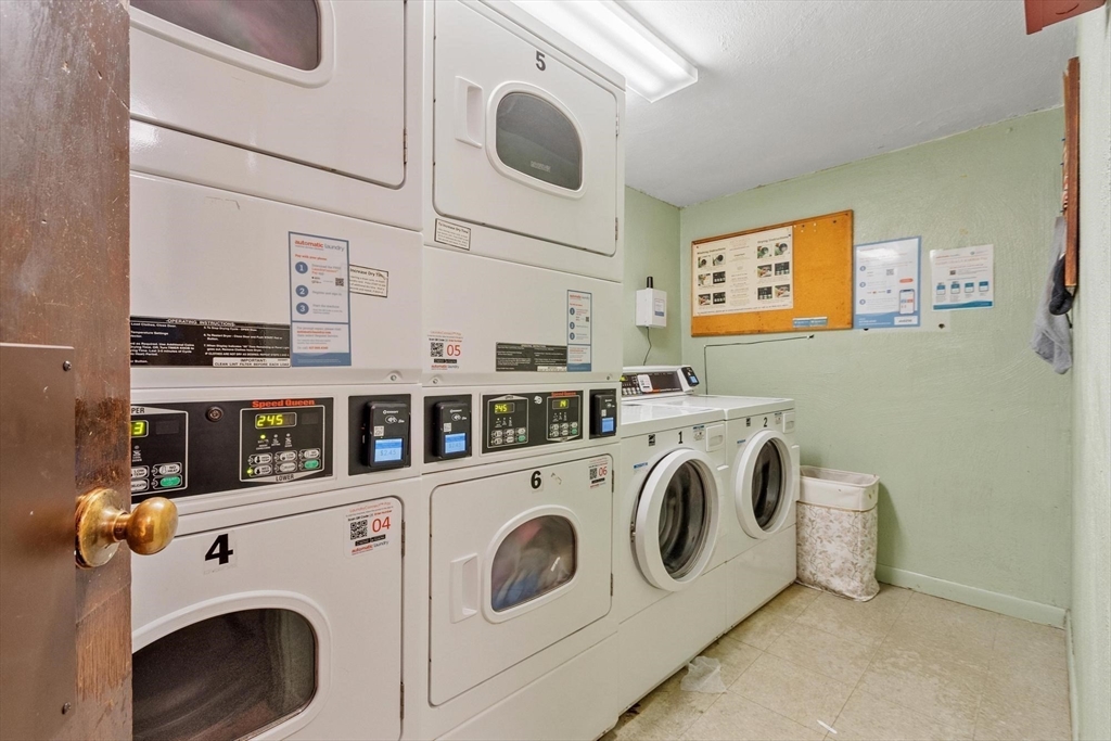 420 Great Road, Unit C1 Acton, MA 01720 - Photo 24 of 29 a utility room with dryer and washer