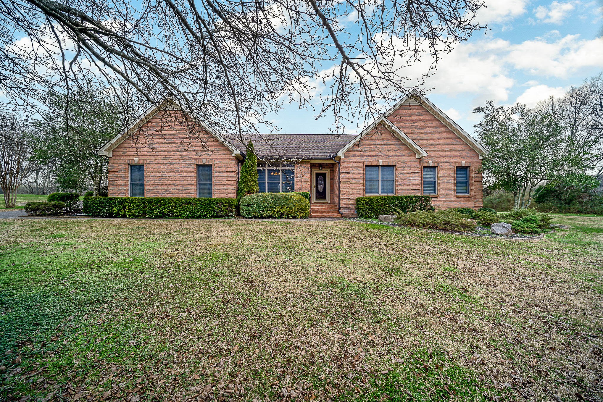 1160 John Sharp Road Spring Hill, TN 37174 - Photo 1 of 51 a front view of house with yard and green space