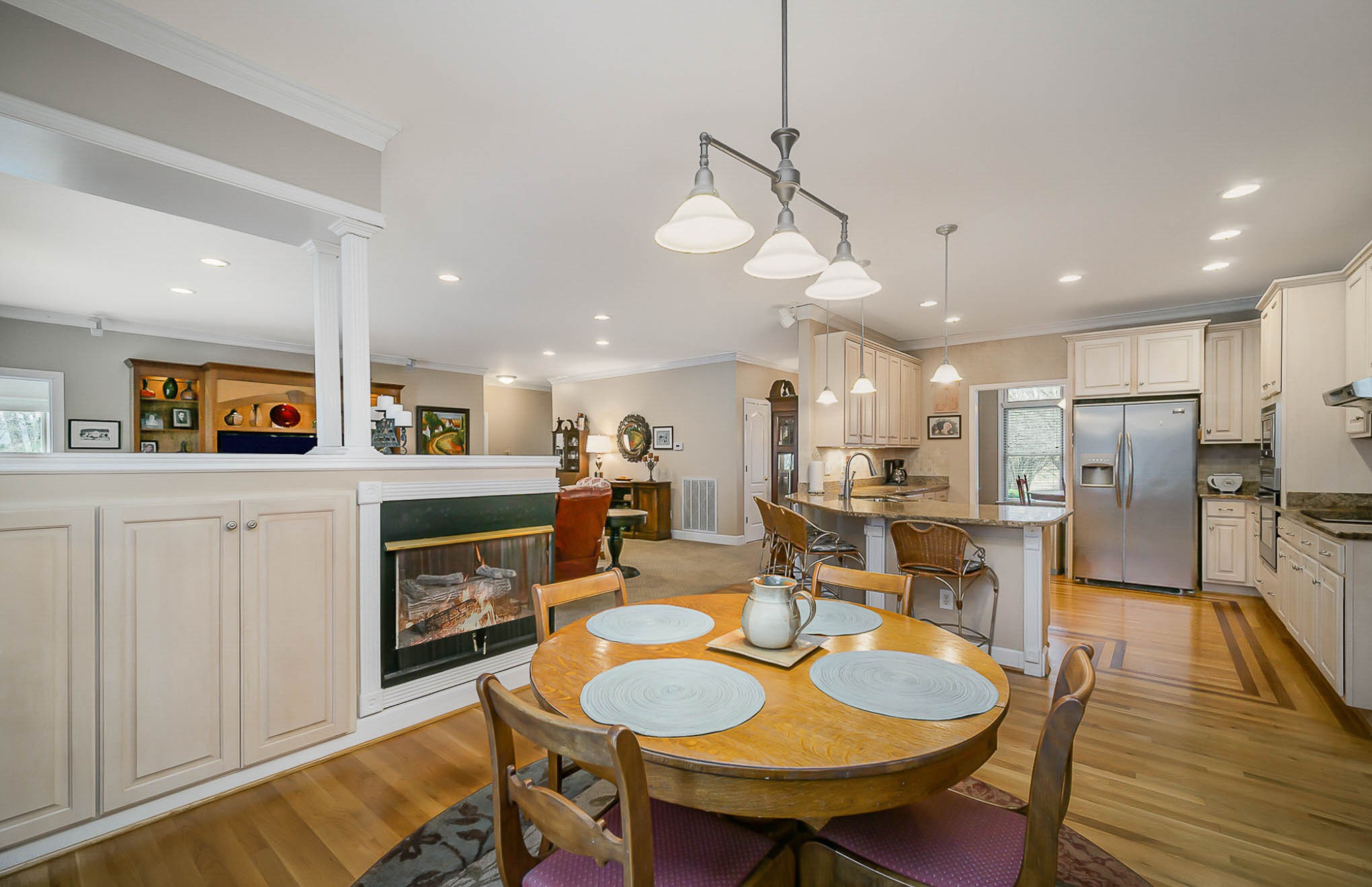 1160 John Sharp Road Spring Hill, TN 37174 - Photo 13 of 51 a open kitchen with kitchen island a dining table and chairs