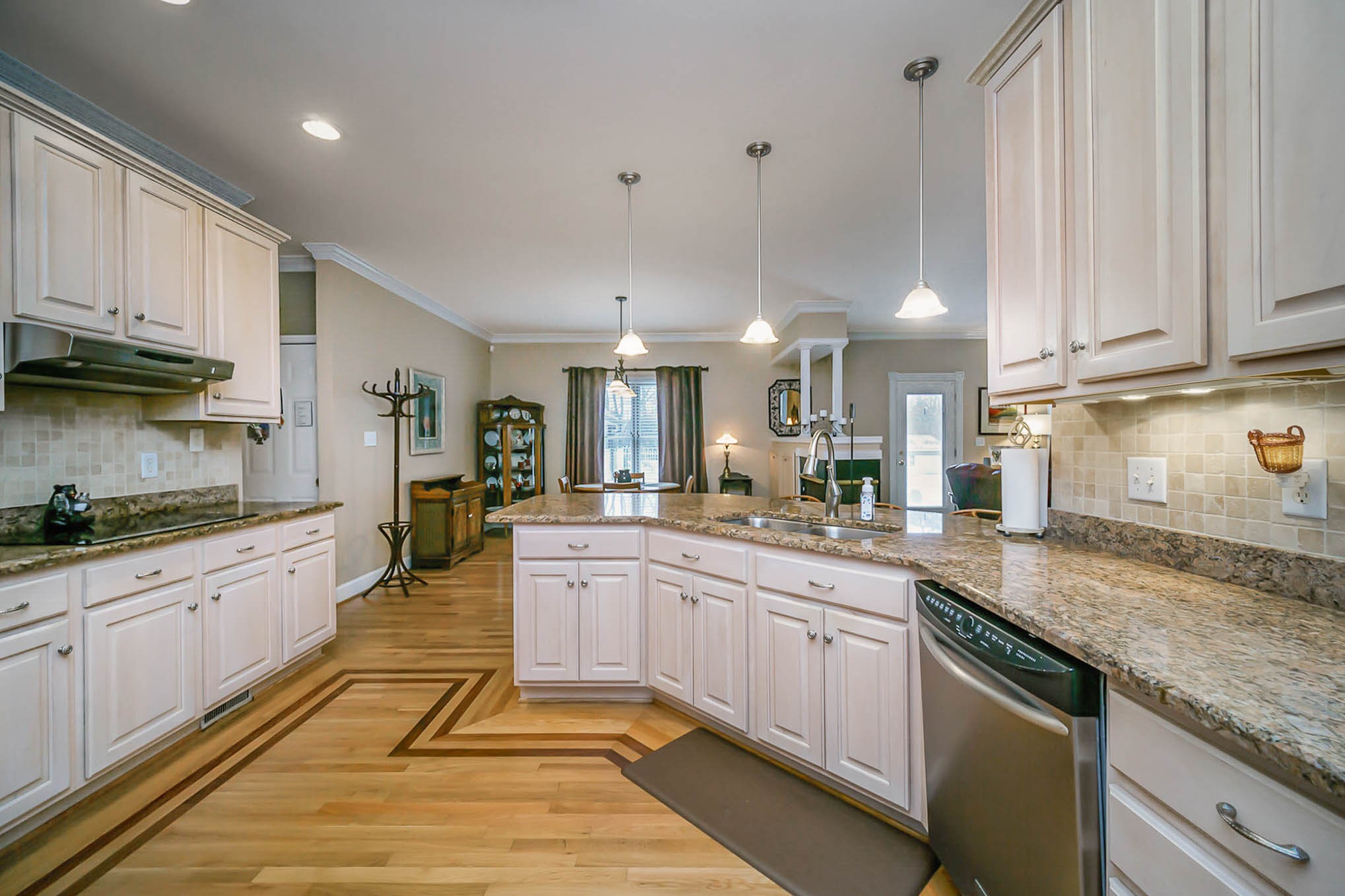 1160 John Sharp Road Spring Hill, TN 37174 - Photo 9 of 51 a large kitchen with stainless steel appliances granite countertop a sink and cabinets
