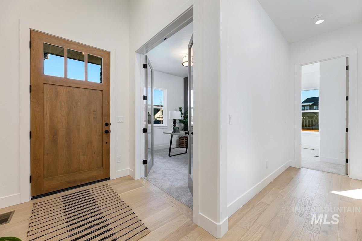 21895 Paint Avenue Star, ID 83669 - Photo 12 of 35 Foyer entrance with light wood-style flooring