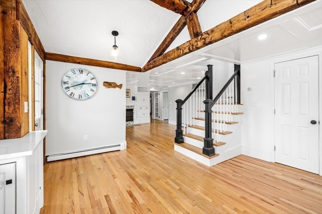 76 Macombers Way Marshfield, MA 02050 - Photo 16 of 41 a view of entryway and hall with wooden floor