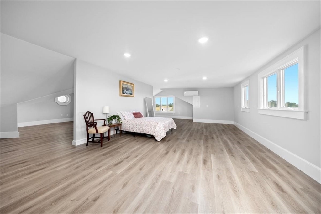 76 Macombers Way Marshfield, MA 02050 - Photo 31 of 41 a spacious bedroom with a bed and a window