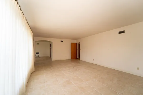 an empty room with a natural light