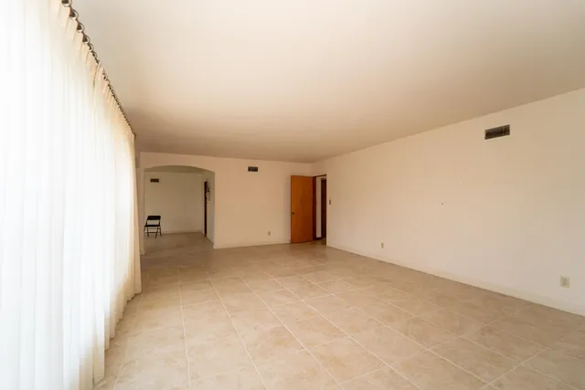 an empty room with a natural light