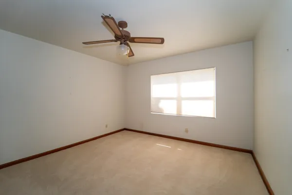 a aerial view of a house with a yard