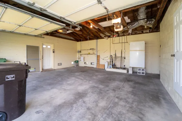 a front view of a house with a big yard