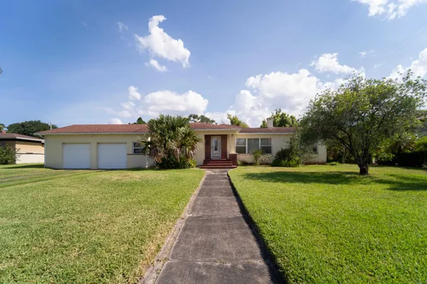 a front view of house with yard