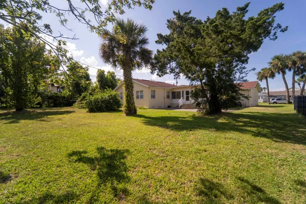 an aerial view of residential house with outdoor space
