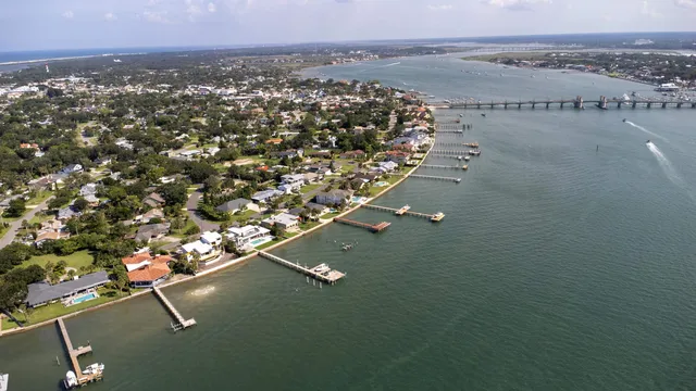 an aerial view of residential house with parking space