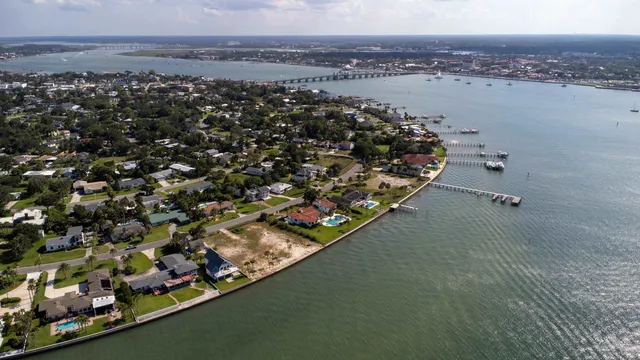 an aerial view of houses and roads