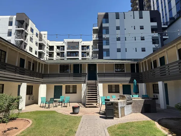 a building view with sitting space and garden space
