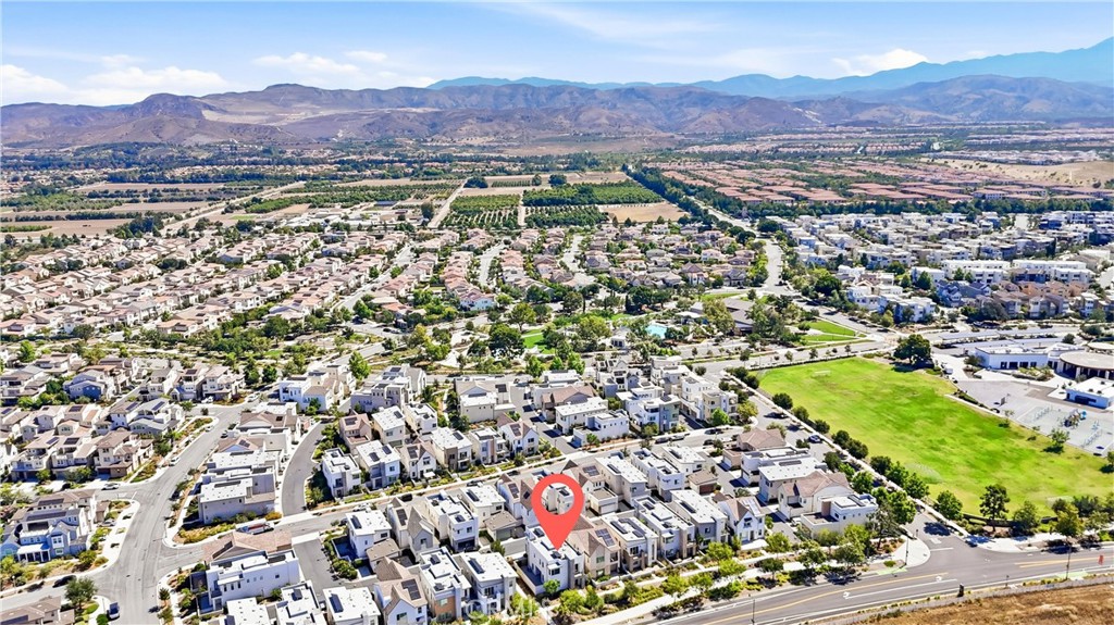 182 Scale Irvine, CA 92618 - Photo 56 of 61 The park is not a perk, it is practically your backyard. Pool, courts, and green lawns just a short walk from your front door.