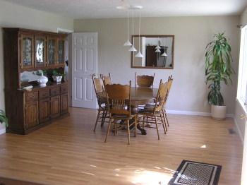 1542 Golf Course Drive Rohnert Park, CA 94928 - Photo 2 of 9 a view of a dining room with furniture and wooden floor