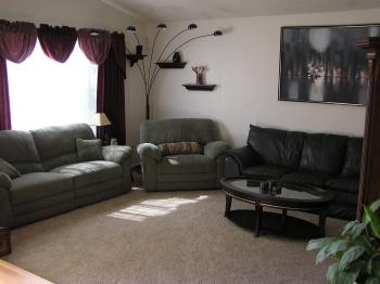 1542 Golf Course Drive Rohnert Park, CA 94928 - Photo 3 of 9 a living room with furniture and a fireplace