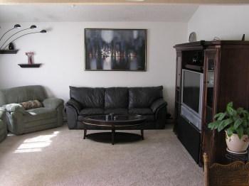 1542 Golf Course Drive Rohnert Park, CA 94928 - Photo 4 of 9 a living room with furniture and a potted plant