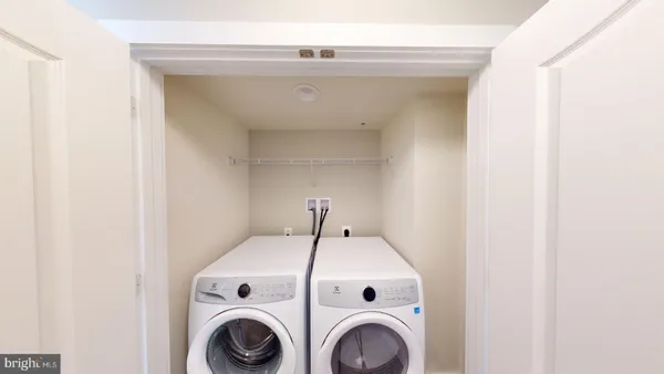 a spacious bathroom with a tub sink and mirror