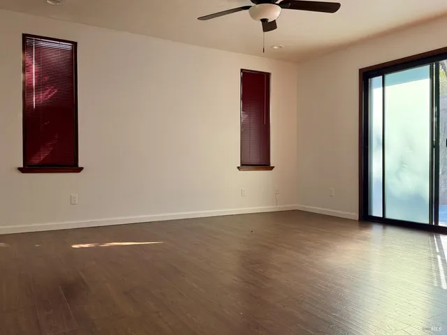 a bathroom with a sink mirror toilet and shower
