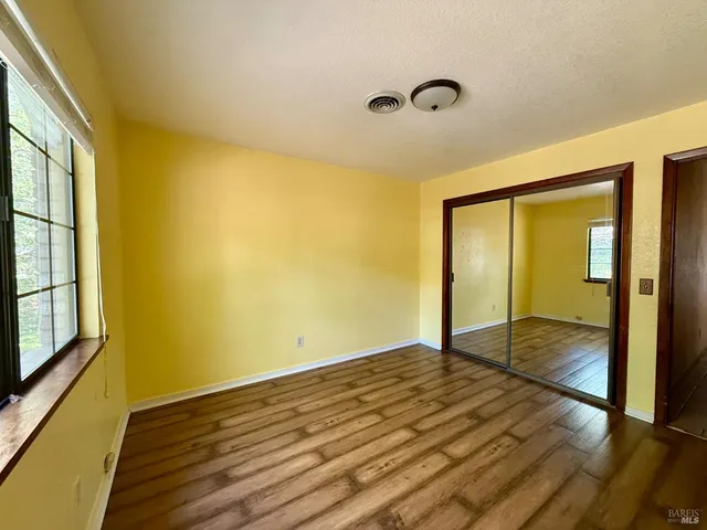 a view of a house with backyard