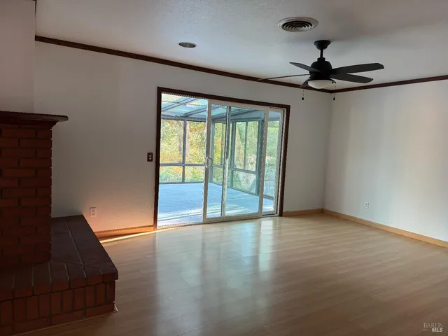 a living room with a fireplace