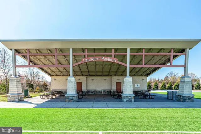 a view of an outdoor space and tennis court