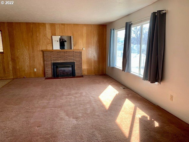 532 Northeast 37th Street Pendleton, OR 97801 - Photo 6 of 21 a view of an empty room with window and fire place