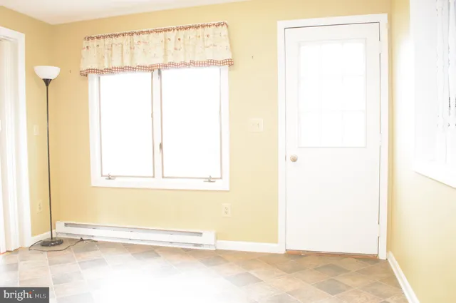 a view of a small space with a window