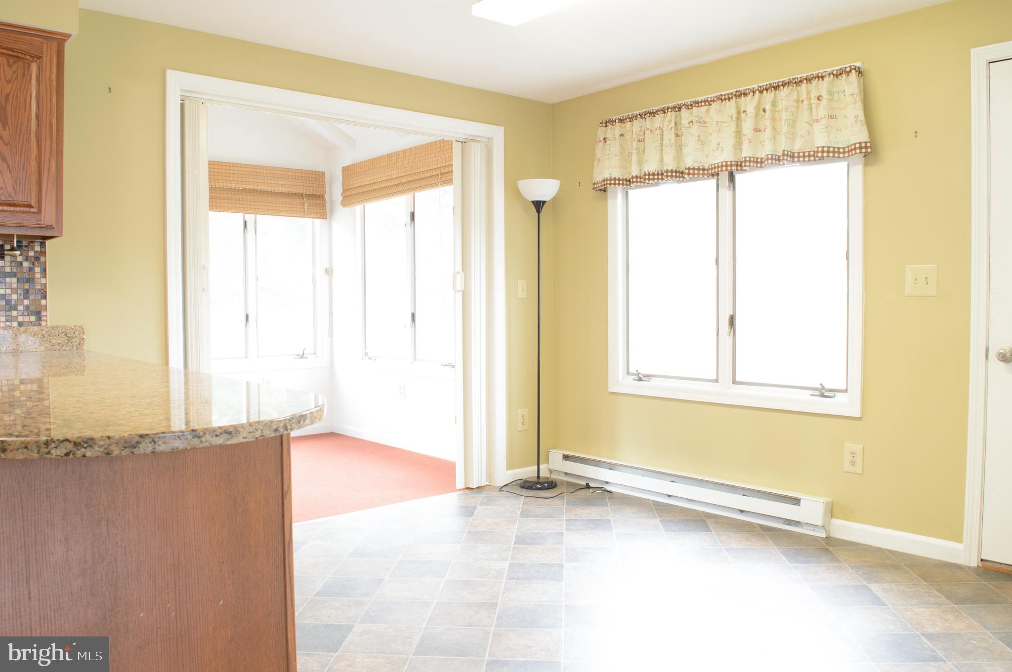 12713 Winchester Road Cumberland, MD 21502 - Photo 26 of 55 a view of an empty room with a window