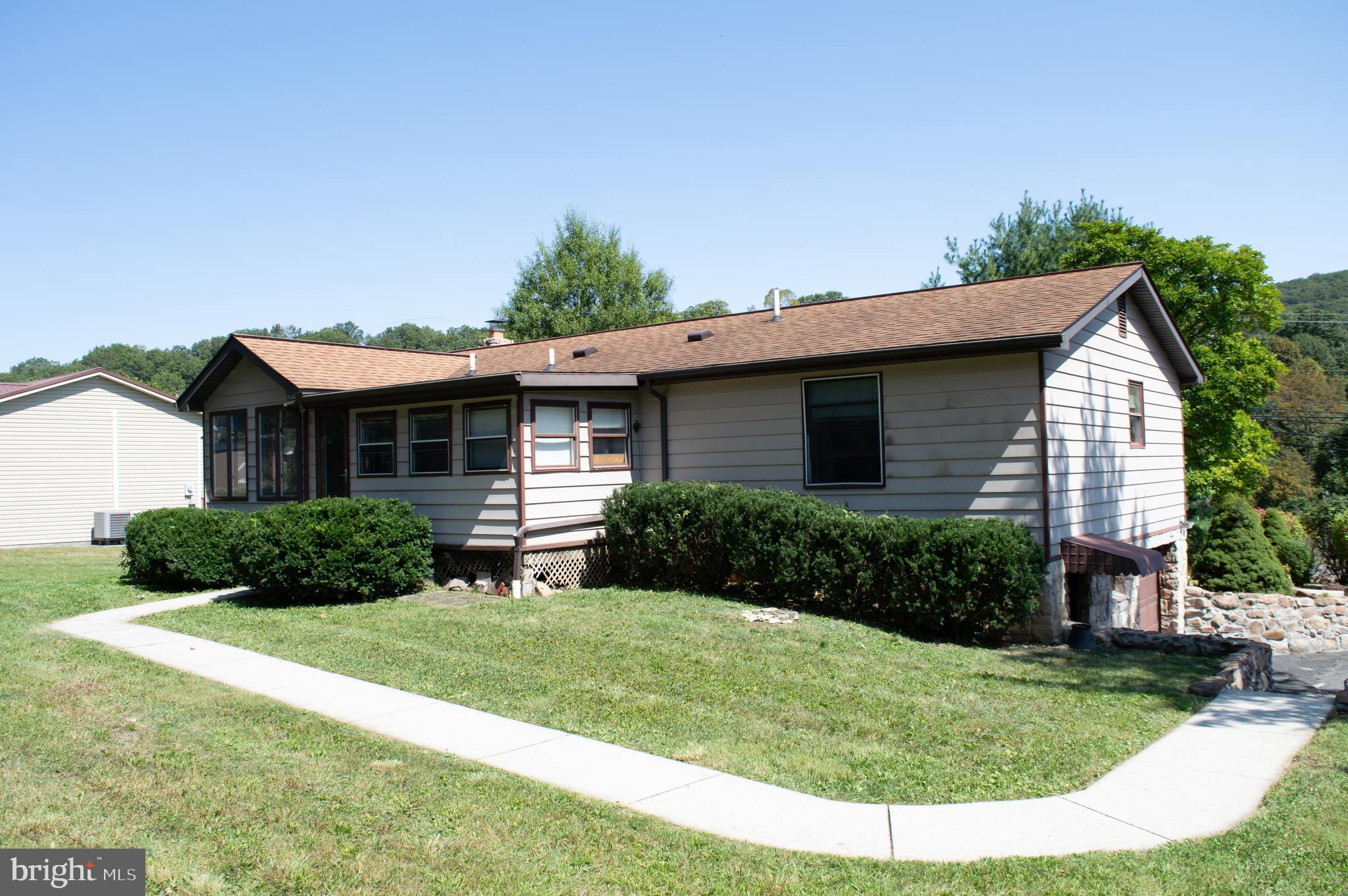 12713 Winchester Road Cumberland, MD 21502 - Photo 5 of 55 a view of house with a yard