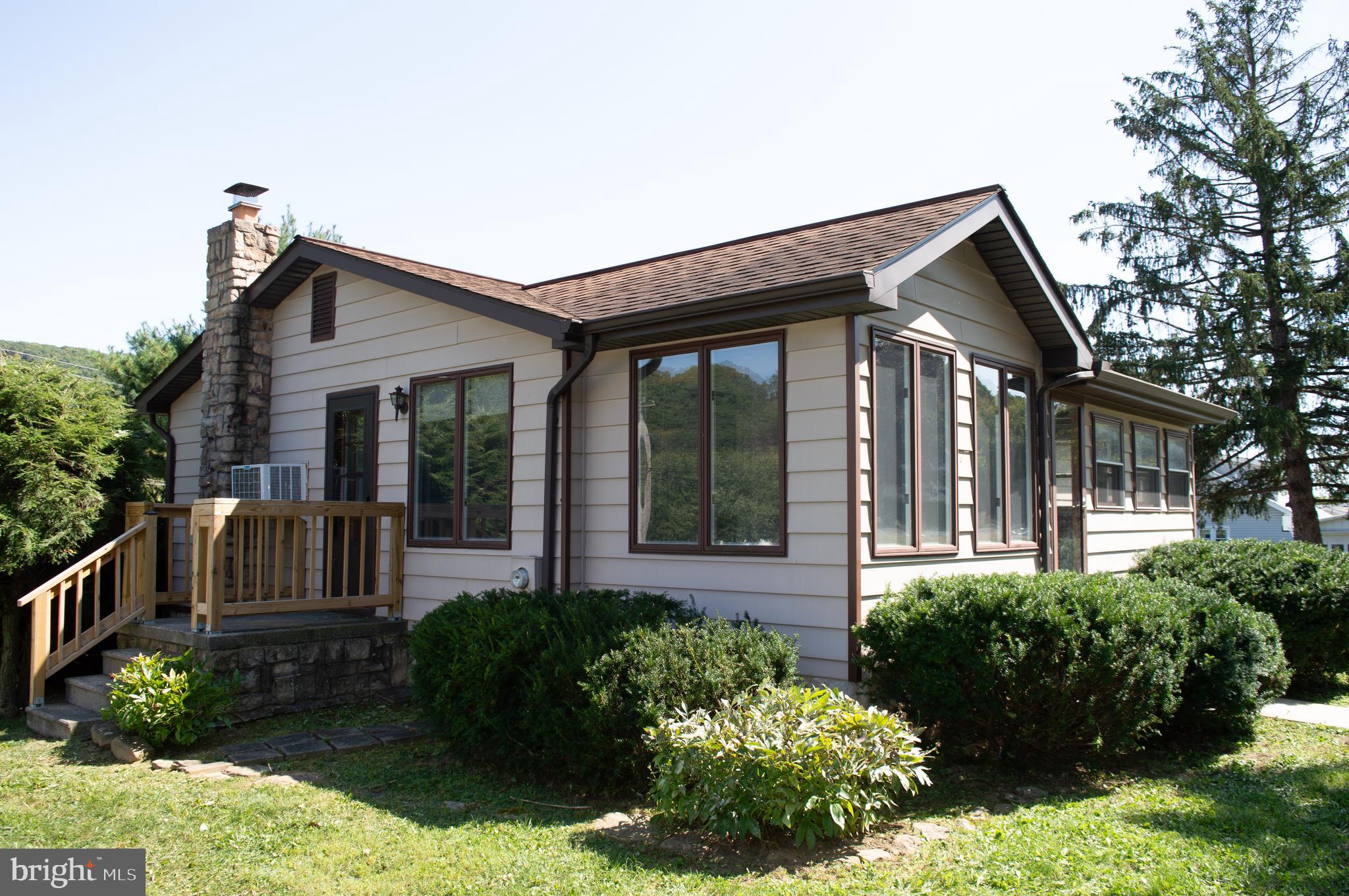 12713 Winchester Road Cumberland, MD 21502 - Photo 7 of 55 front view of a house with a yard
