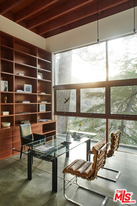 3201 Coldwater Canyon Lane Beverly Hills, CA 90210 - Photo 10 of 23 a room with furniture and a large window