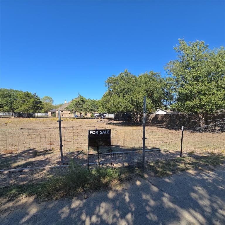 a view of a lake with a bench and lake view
