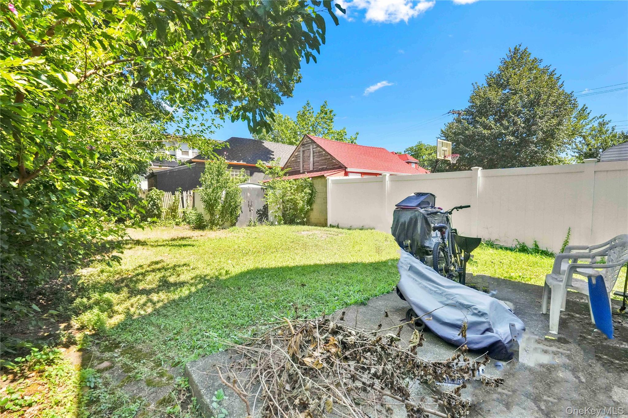 190-63 112th Avenue Queens, NY 11412 - Photo 8 of 11 a view of a house with backyard and sitting area