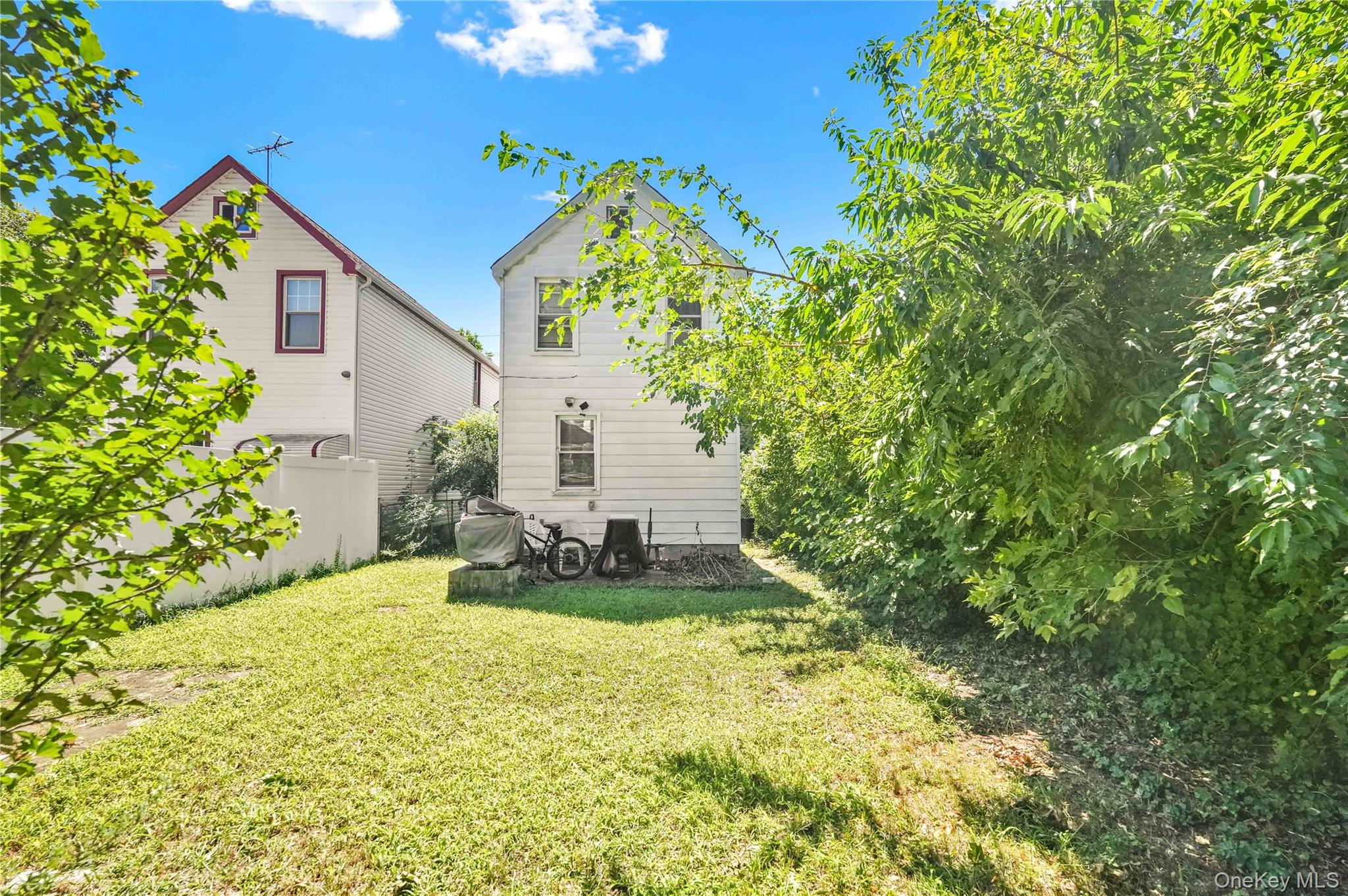 190-63 112th Avenue Queens, NY 11412 - Photo 9 of 11 a view of a backyard with plants and garden