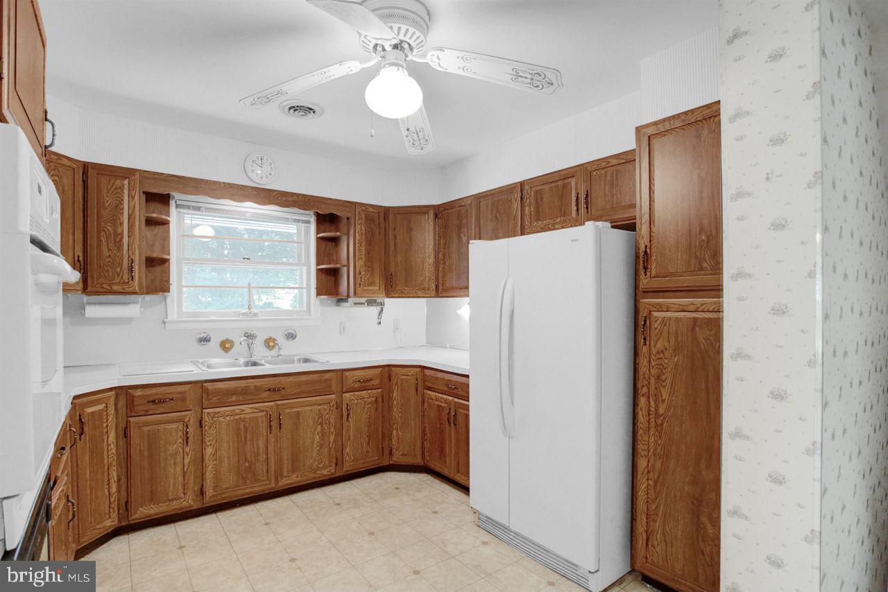 3409 River Road Reading, PA 19605 - Photo 11 of 41 a kitchen with stainless steel appliances a refrigerator and a sink