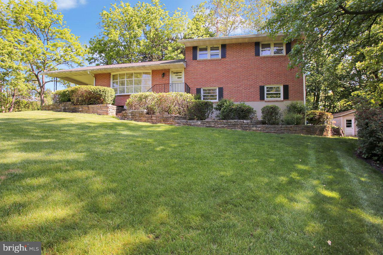 3409 River Road Reading, PA 19605 - Photo 2 of 41 a front view of a house with garden