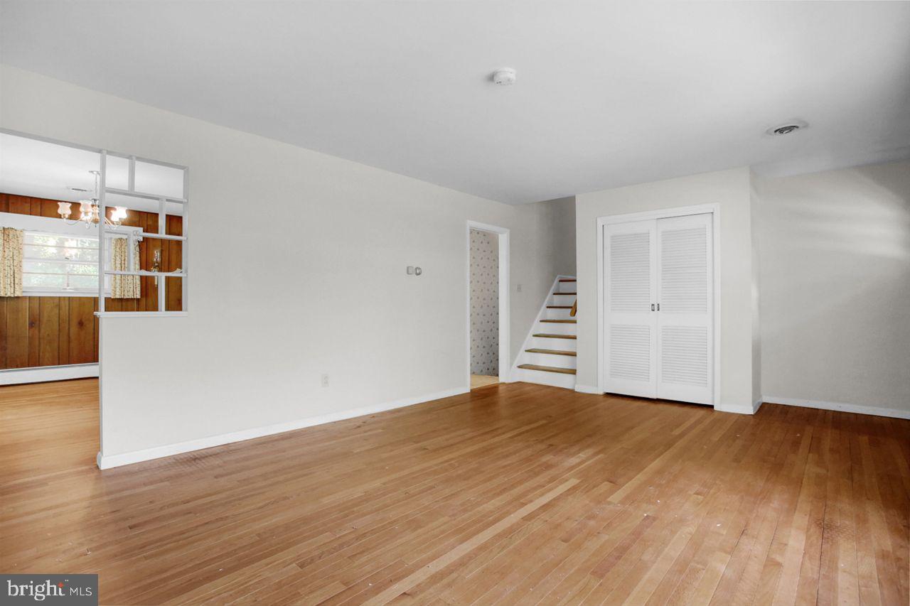 3409 River Road Reading, PA 19605 - Photo 6 of 41 a view of an empty room with wooden floor and a window