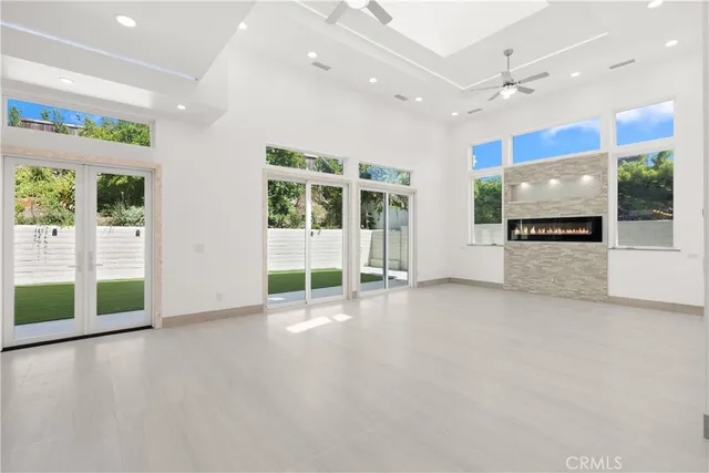 a kitchen with stainless steel appliances granite countertop a stove and a refrigerator