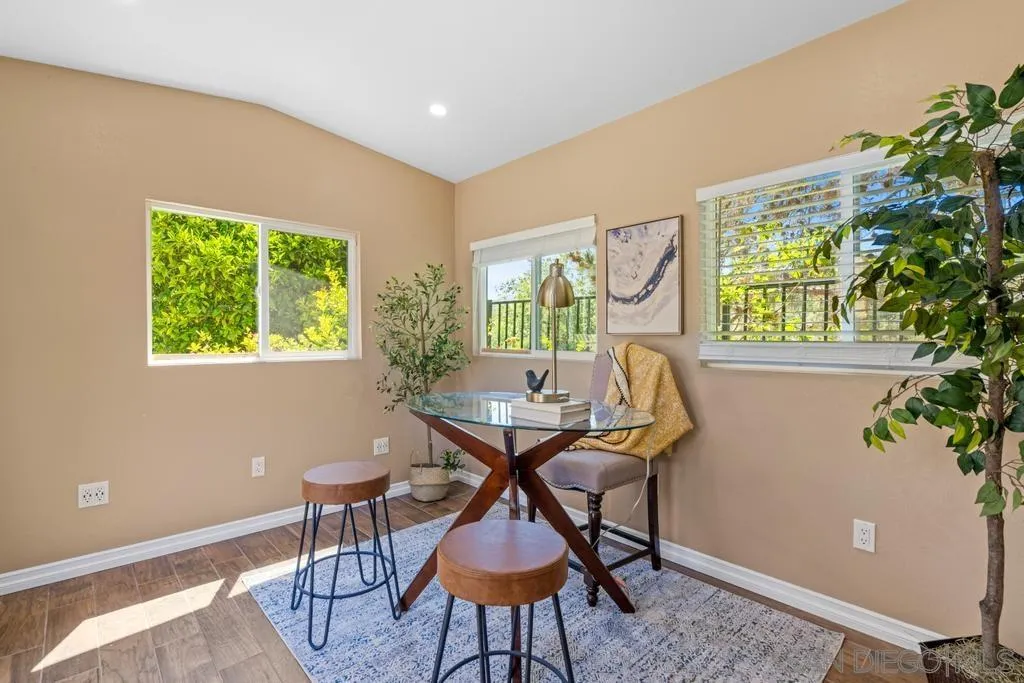 789 Poppy Road San Marcos, CA 92078 - Photo 32 of 43 a workspace room with furniture and a potted plant