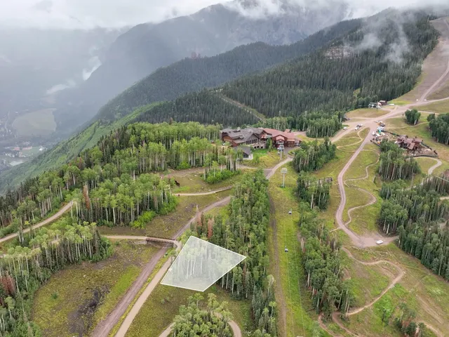 a view of swimming pool with a yard