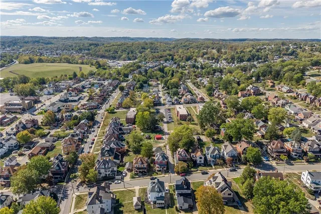 an aerial view of a city with lots of residential buildings