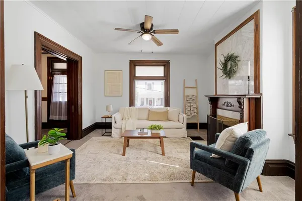 a living room with furniture or couch and a window
