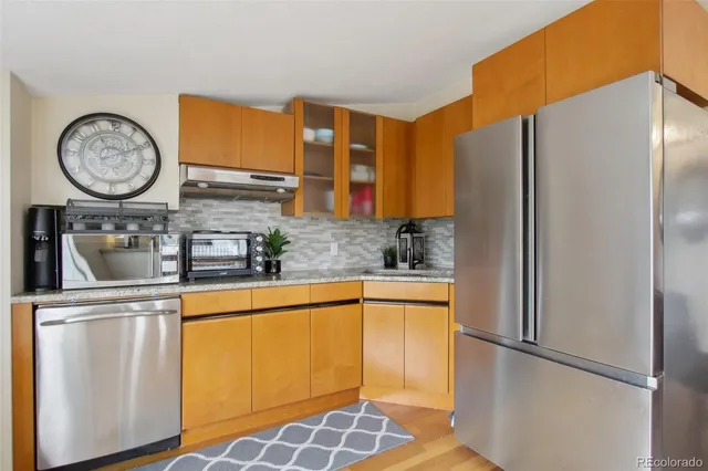 a bed room with a bed and window