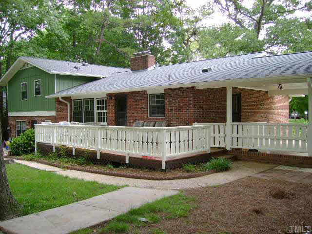 1208 Deboy Street Raleigh, NC 27606 - Photo 4 of 7 Rear view of house showing spacious deck. Other