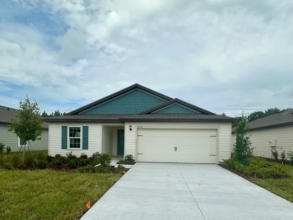front view of house with a yard